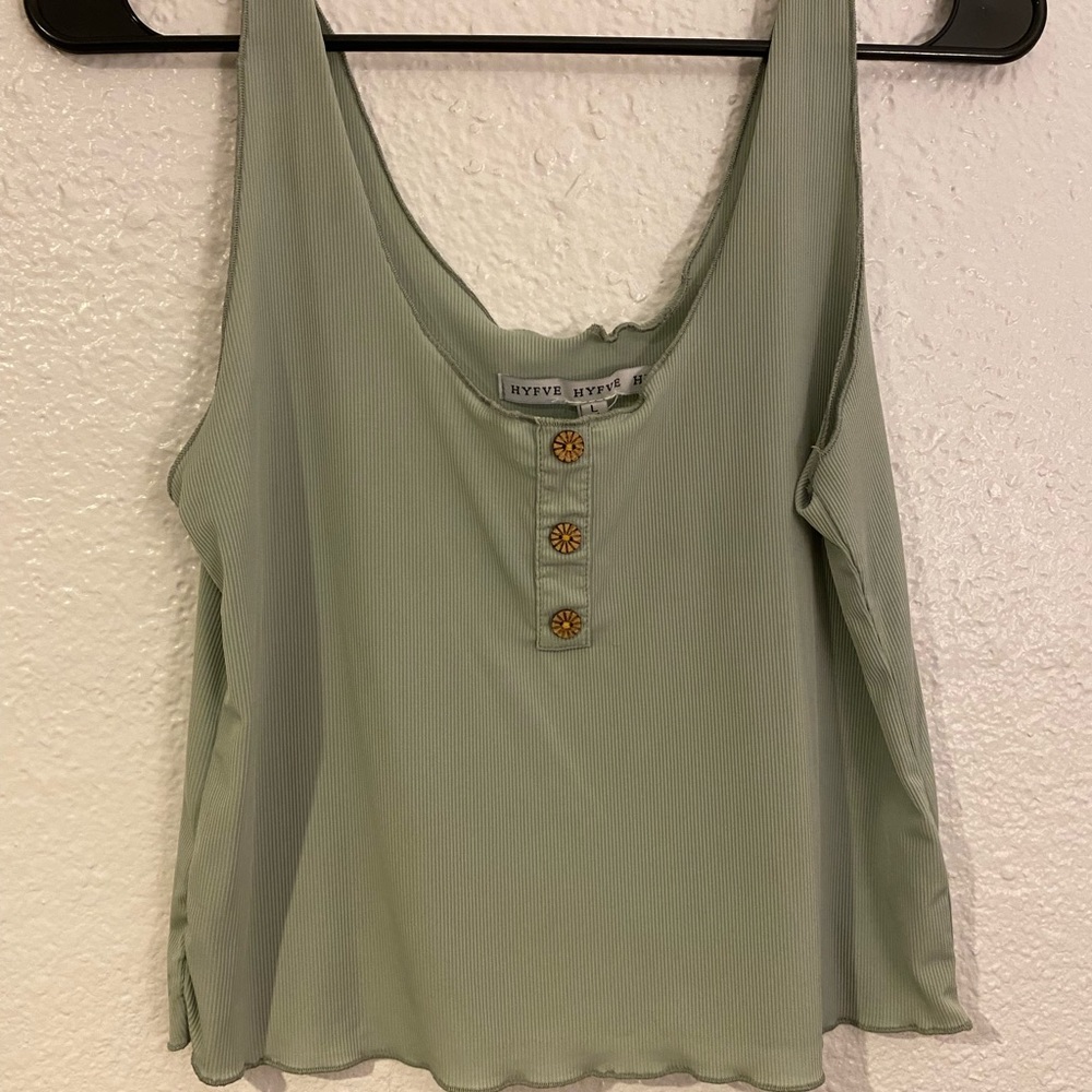 Jade colored tank top fits like a crop top